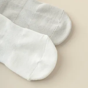 Closeup of soft non-slip yoga socks knit texture detail for women fitness and daily floor wear.