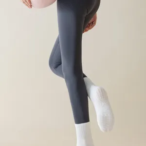 Women's non-slip yoga socks with mid-tube design, perfect for fitness, pilates, and dance.