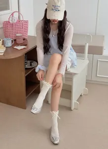 White lace ruffle mid-tube socks paired with silver ballet flats, sweet Japanese fashion style.