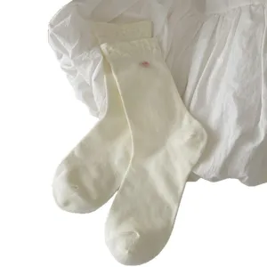 White lace mid-calf socks for women, sweet Japanese ballet style cotton hosiery.