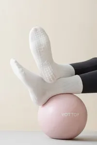 Non-slip yoga socks with silicone grips, mid-calf breathable cotton for pilates dance fitness.