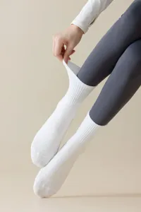 Non-slip yoga socks for women, mid-tube fitness pilates sports socks, breathable white.