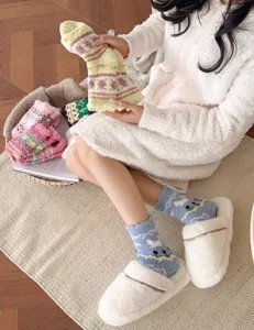 Cozy fuzzy fleece winter socks for women, thick warm sleep socks with cute Nordic patterns.