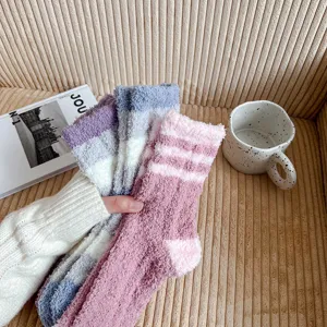 Cozy striped fuzzy coral fleece socks for women, thick and warm winter sleep floor socks.