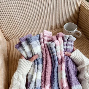 Cozy stripe coral fleece fuzzy socks detail showing soft plush texture and warm winter design.