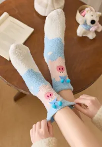 Cozy winter coral fleece socks with cute cartoon pig design, thick and warm for home use.