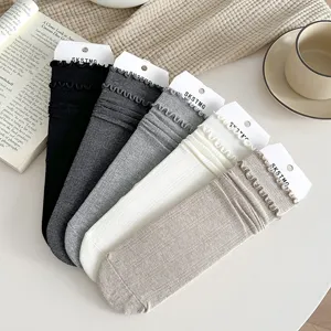 Solid color ruffle mid-tube women socks autumn winter casual cotton stack socks detail view