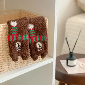 Cozy coral fleece winter socks featuring cute 3D bear ears and festive scarf design. Warm and thick.