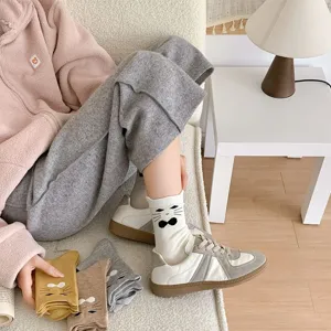 Details of cute 3d cat socks for women, featuring soft cotton fabric and cozy mid tube length design.