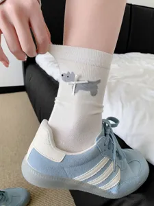 Cute cartoon dog mid-calf socks for women with 3D bowknot, breathable cotton casual hosiery.