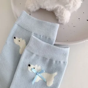Cute light blue mid-calf socks for women featuring sweet white dog and 3d bow details.