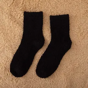 Cozy black fuzzy socks for women and men, soft thick winter warm coral fleece sleep floor socks.