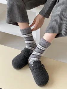 Thickened warm fuzzy coral fleece striped socks with retro design for cozy winter home wear.