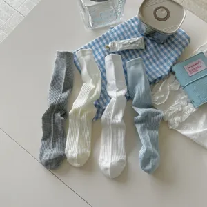 Ribbed mid-tube socks detail shot, soft breathable cotton blend casual hosiery in versatile colors.