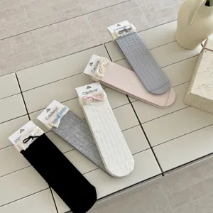 Vista detallada de calcetines mujer lazo encaje estilo coreano malla fino y lindo estilo.