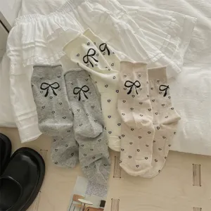 Summer women's thin ballet style rolled cuff bow socks with cute heart jacquard pattern.