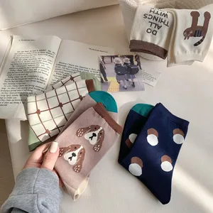 Comfortable women cotton mid-tube socks with cute animal and plaid patterns daily wear.