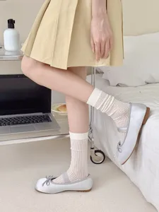Spring summer women sheer hollow calf socks with ballet style Mary Jane flats, stylish mesh look.