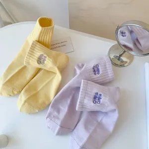 Solid color cute embroidered short socks set for women, soft cotton casual daily wear.