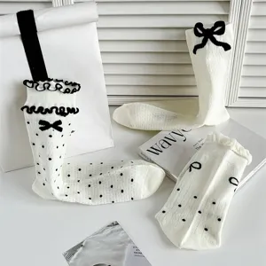 Balletcore white mid-calf socks with black bows, ruffles and polka dots. Summer hosiery.
