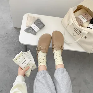 Japanese style polka dot slouch socks for women, comfortable breathable casual cotton hosiery.