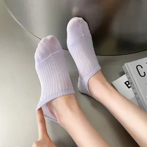 Detail view of light purple mesh short socks, breathable summer boat socks with ribbed cuffs.