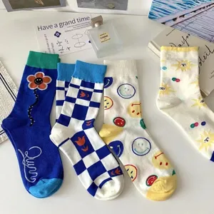 Cute women mid tube socks with floral, check and smiley designs for spring summer wear.