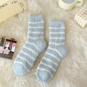 Cozy coral fleece striped warm socks for women, thick fluffy winter sleep socks detail.