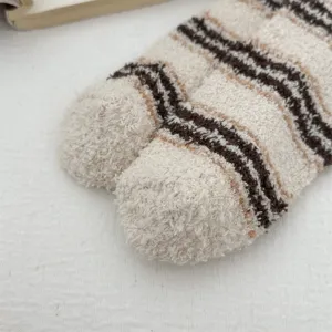 Men's thick coral fleece fuzzy striped sleep socks detail view, soft warm home floor socks.