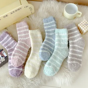 Cozy striped fluffy coral fleece socks for women, thick warm winter sleep socks, soft detail.