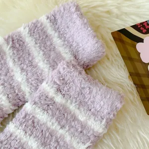 Thickened plush striped socks for women, cozy winter warm coral fleece sleep socks detail.