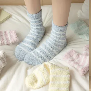 Thickened soft coral fleece striped fuzzy socks, cozy warm winter sleep socks indoor detail.