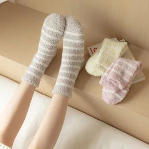 Cozy striped coral fleece warm socks for women, thickened soft winter sleep socks detail.
