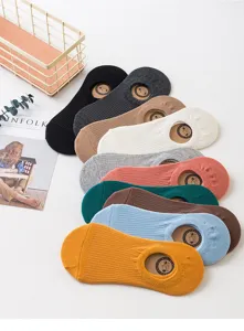 Comfortable solid color low-cut invisible socks for women, breathable cotton ribbed daily wear.