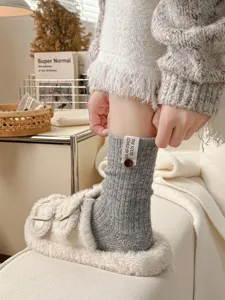 Thickened ribbed knit wool blend mid-tube warm slouch socks for women, retro style.