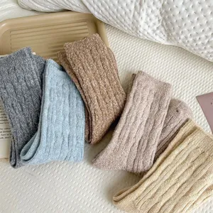 Cozy thick knit wool blend pile socks for women, warm winter thermal floor socks with cable knit design.
