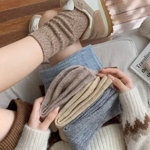 Women's thick wool slouch socks for autumn and winter, cozy fleece floor socks for warmth.