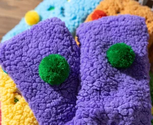Cozy plush floor socks with cute pom pom details, thick warm fuzzy winter home socks for women.