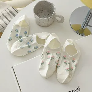 Detail view of women summer floral low-cut boat socks, breathable invisible cotton blend.