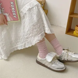 Summer women's thin mid-tube socks with polka dot jacquard and cute lettuce edge design.