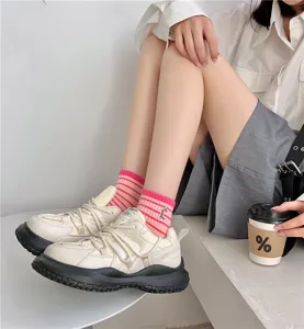 Women's casual fashion socks and sneakers set, stylish striped design with embroidered letter detail.