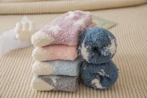 Cozy fuzzy coral fleece winter sleep socks with cute star patterns, soft and warm home floor socks.