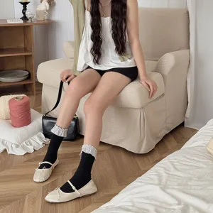 Chaussettes mi-longues noires à revers à carreaux style doux pour femmes confortables mode