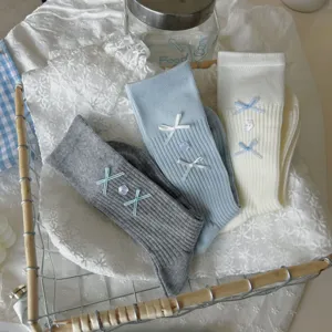 Cute women crew socks with sweet bows and buttons, sweet lolita style knit hosiery detail.