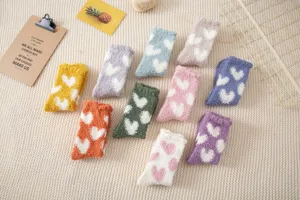 Cozy winter coral fleece fuzzy socks with cute heart patterns, warm thick sleep floor socks.