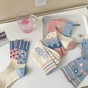 Cute spring and summer mid-calf socks with sweet pink and blue floral embroidery and heart patterns.