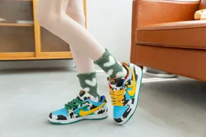 Winter warm coral fleece women socks with cute heart patterns, thick plush indoor floor wear.