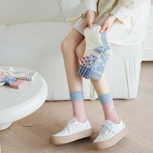 Cute women's mid-tube socks with tulip embroidery, pink and blue spring daily wear.