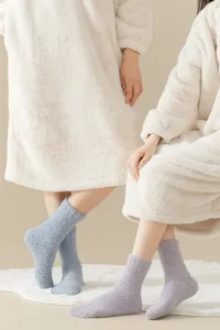 Cozy coral fleece fuzzy socks detail view, thick warm winter sleeping floor socks for women.