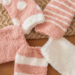 Cozy coral fleece plush socks for women, warm thickened winter floor socks with cute patterns.